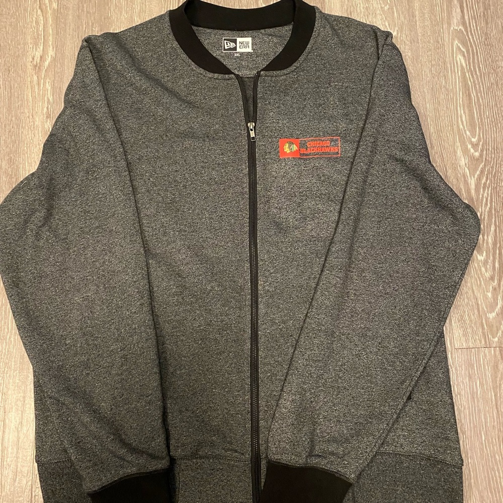 New without tags XXL Chicago Blackhawks zip up jacket.